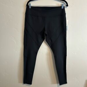 NWT Zella black leggings sz lg with sheer side panels from the hip to the ankle